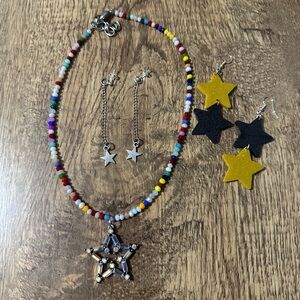 New multi colored beaded star necklace with 2 pr star earrings.